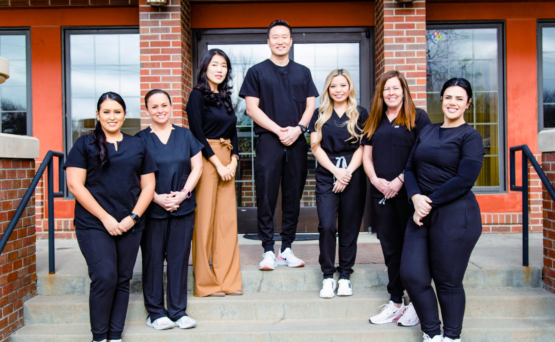 Sim Family Dental team group photo